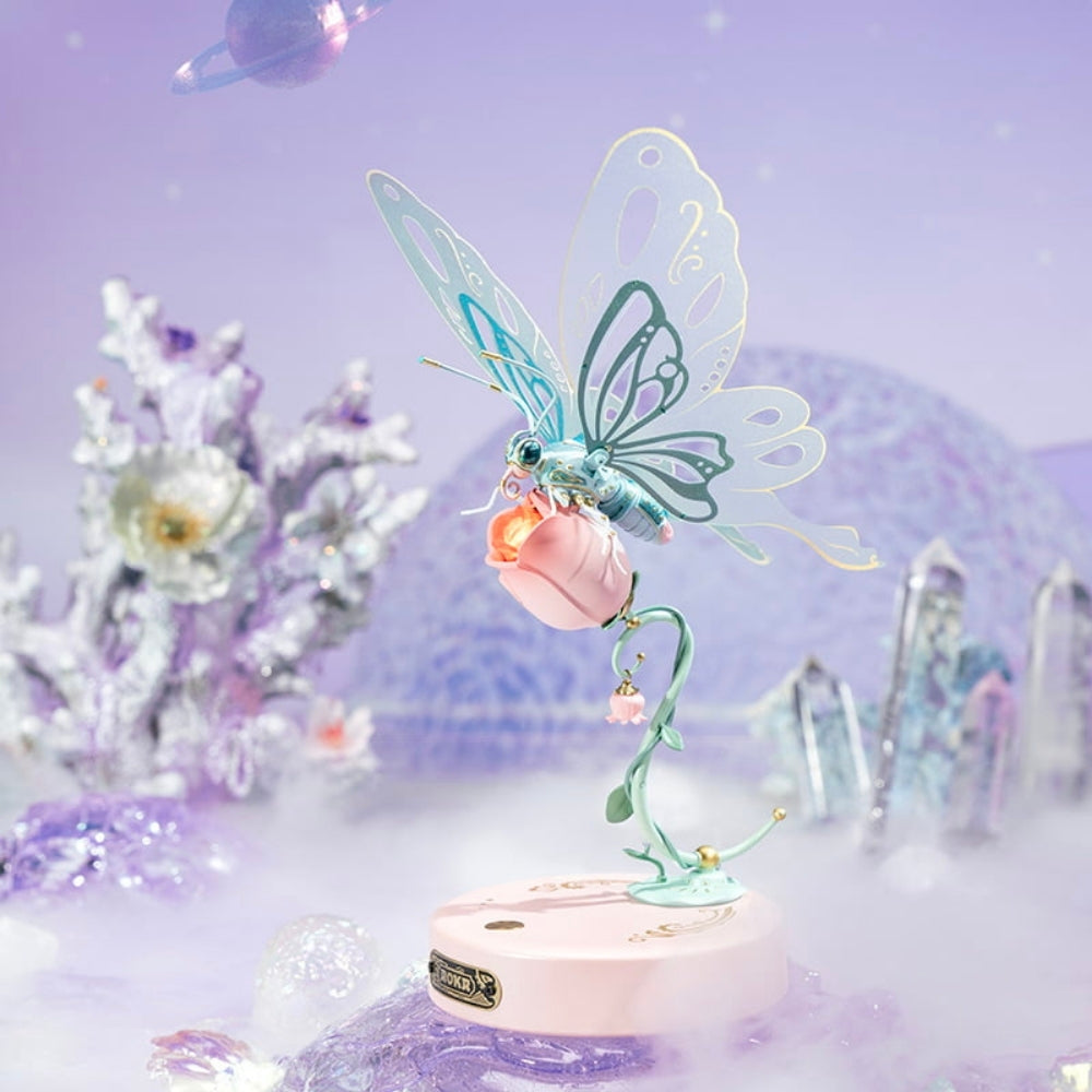 Decorative fairy figurine with pastel colors on a light purple background
