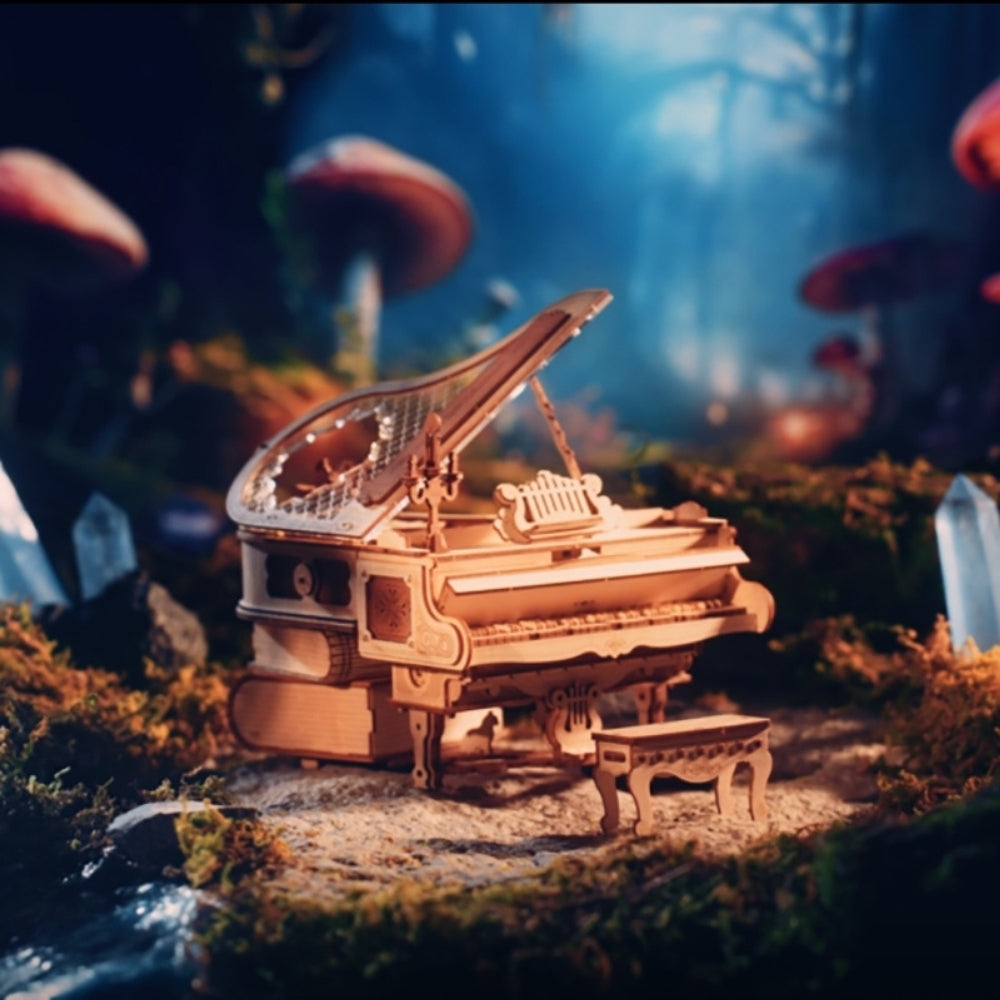 Wooden model of a grand piano in a fantasy forest setting with glowing mushrooms.