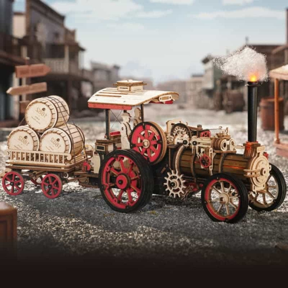 Wooden model of a steam locomotive with barrels on wheels in a Western-themed setting.