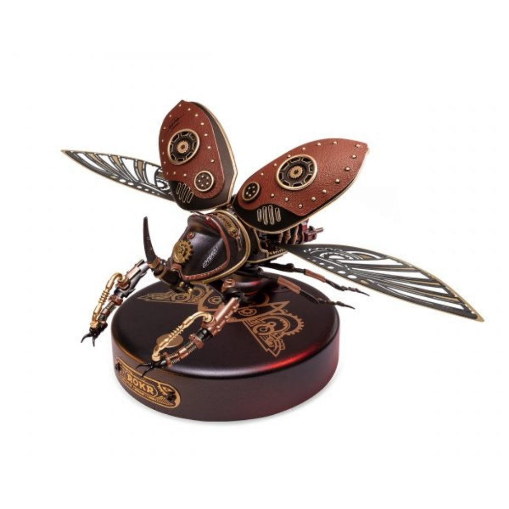 Steampunk-style insect sculpture on a white background