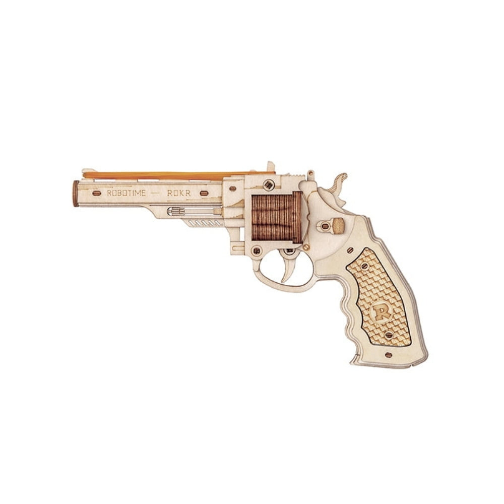 Wooden model of a revolver on a white background