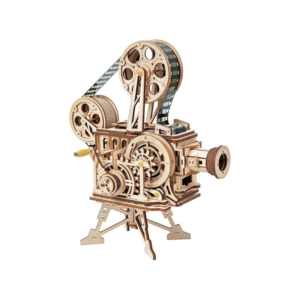 Wooden model of a vintage movie projector on a white background