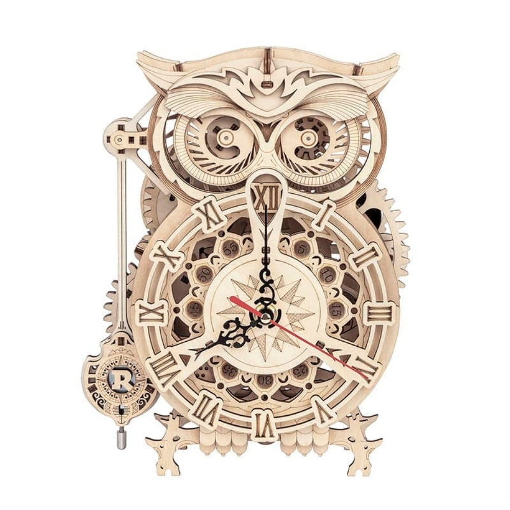 Wooden mechanical owl clock on a white background