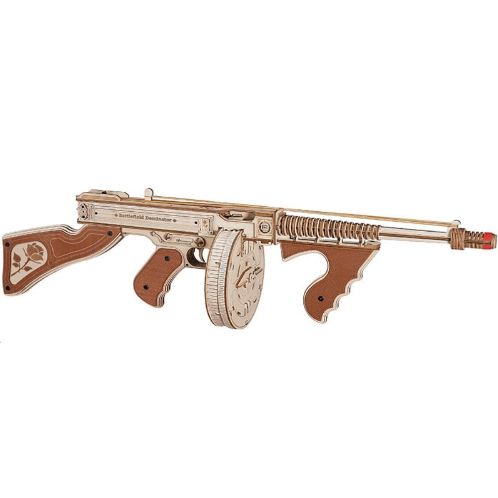 Decorative gun with intricate design on a white background