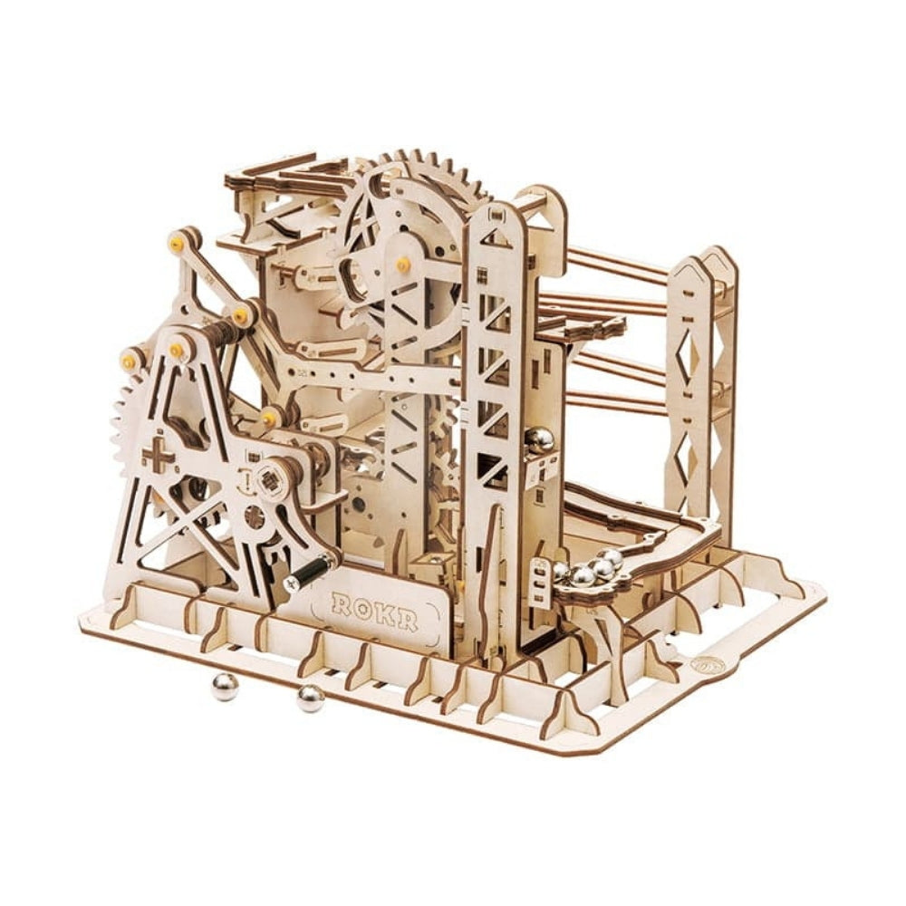 Wooden mechanical model kit with gears on a white background