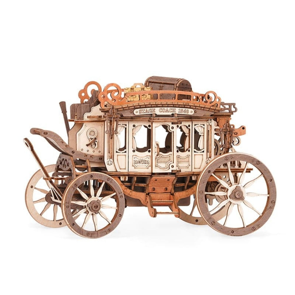 Wooden model of a stagecoach on a white background