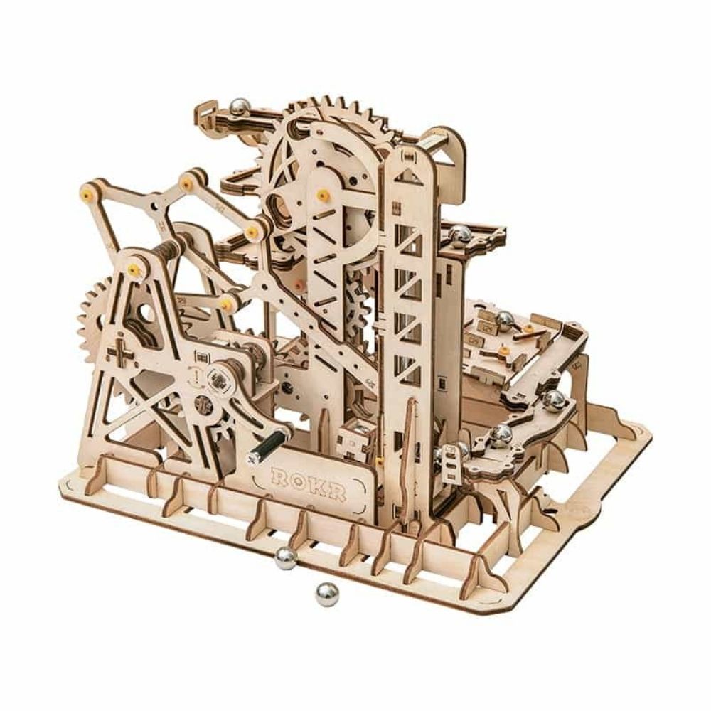 Wooden mechanical model kit on a white background