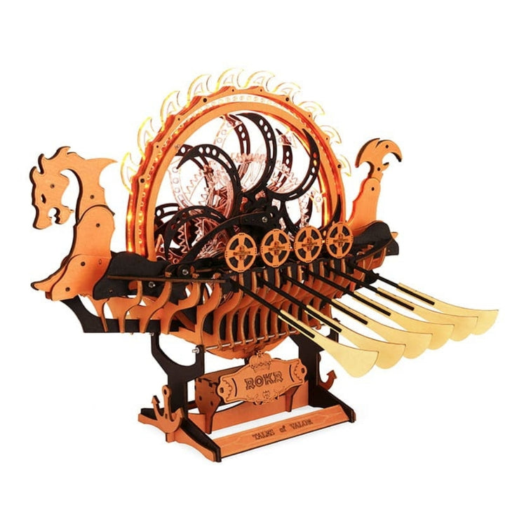 Wooden dragon model with mechanical components on a white background