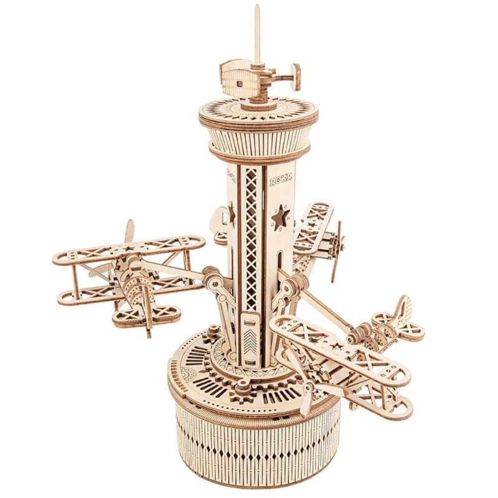 Wooden mechanical model kit on a white background