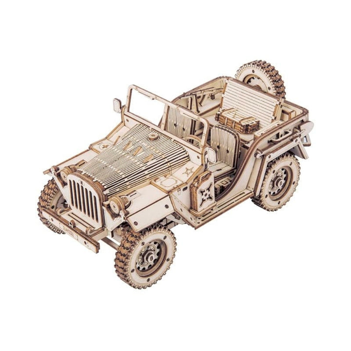 Wooden model of a jeep on a white background