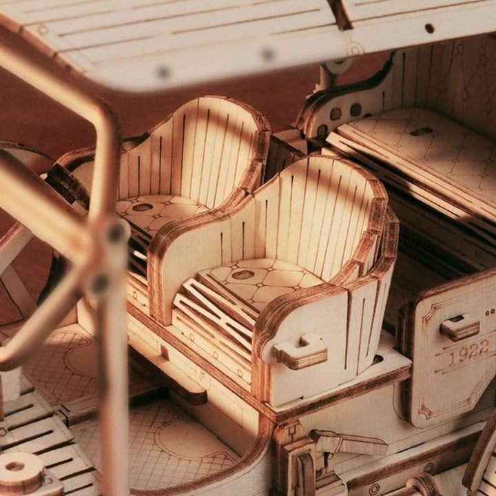 Close-up of a wooden model ship with detailed interior