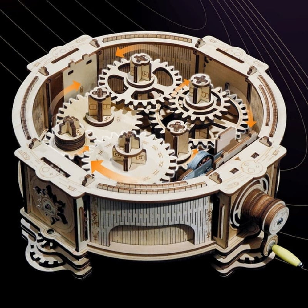 Wooden mechanical model with gears on a black background