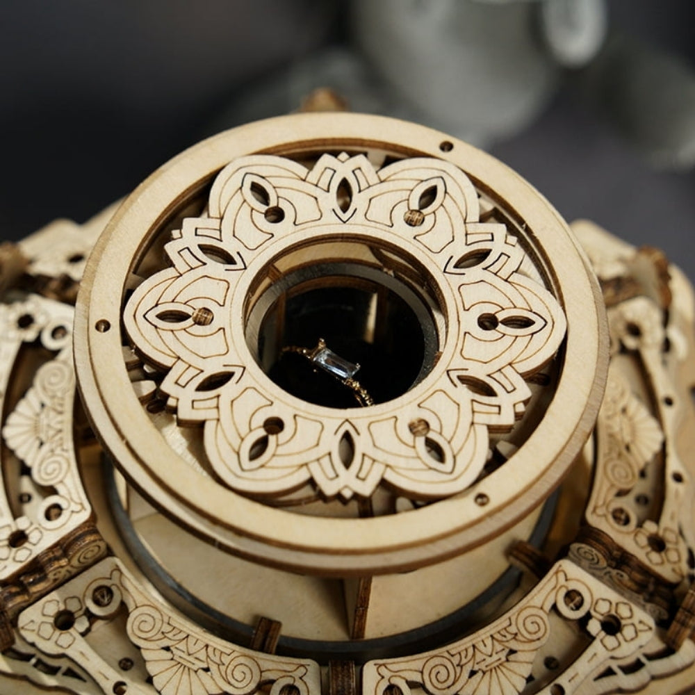 Close-up of a wooden mechanical model with intricate patterns