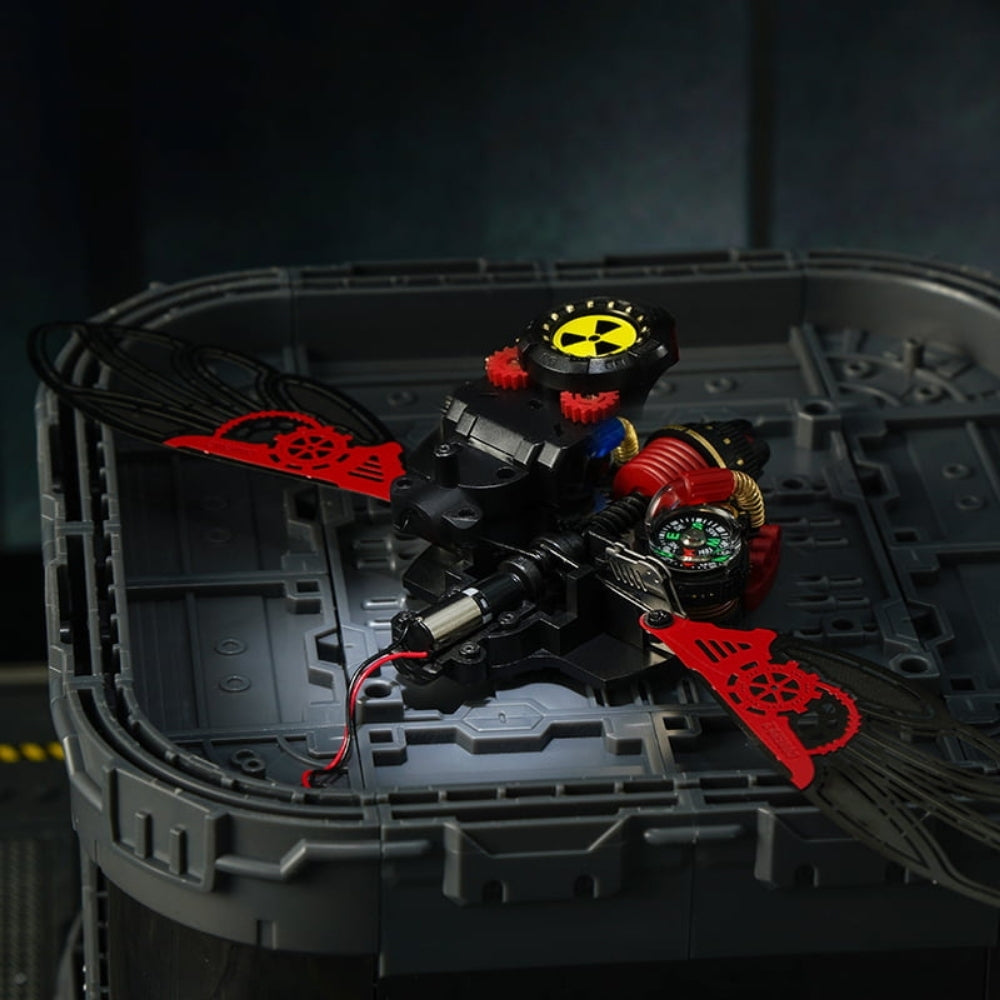 Toy figure with red accents on a gray base