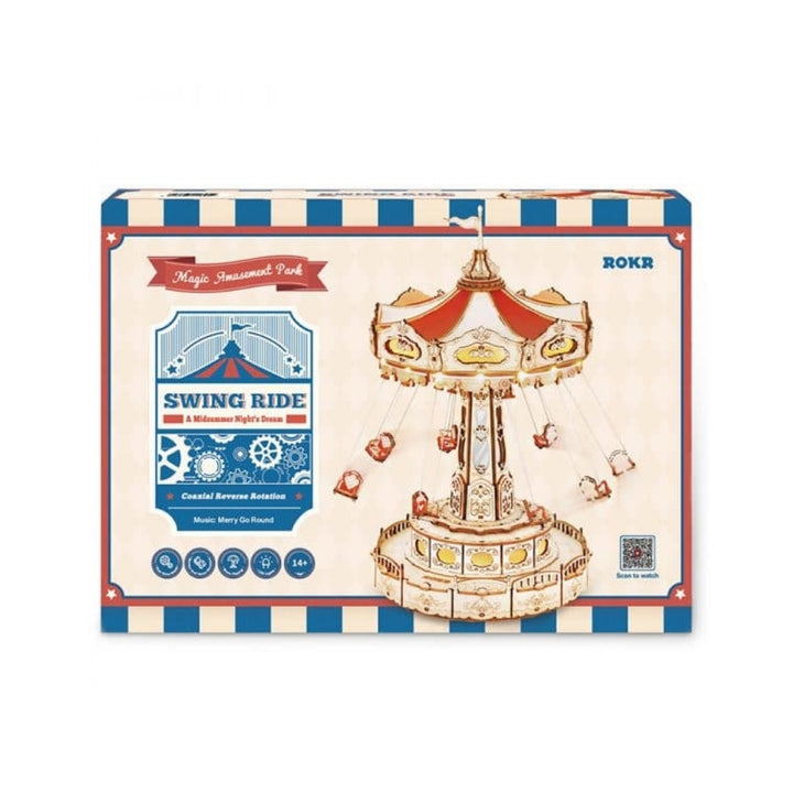 Box of a mechanical model kit with a swing ride design on a white background