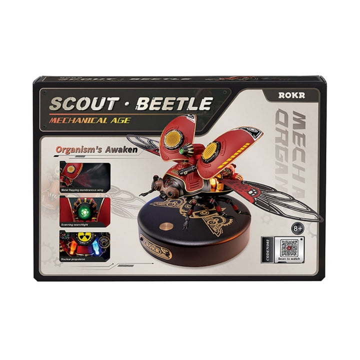 Boxed toy figure of a red and black beetle with 'Scout Beetle' branding on a white background.