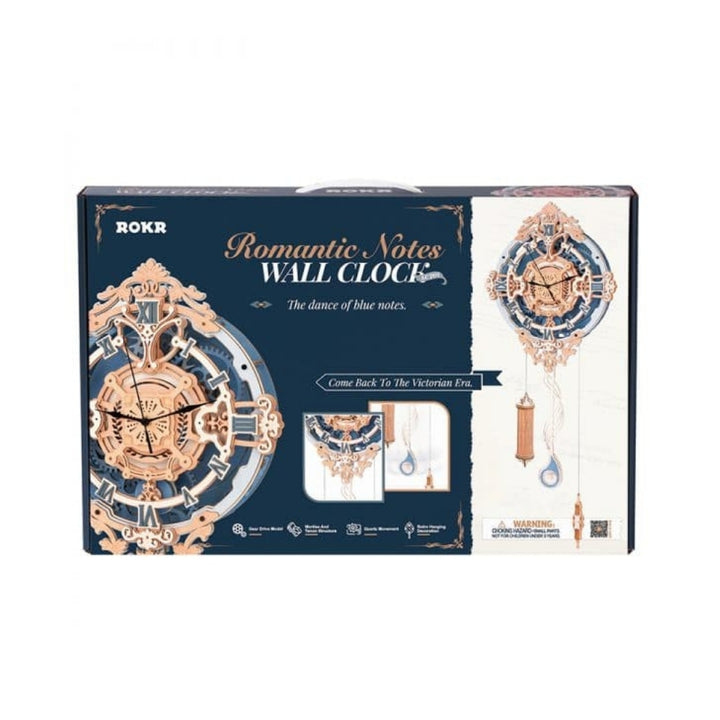 Boxed ROKR Romantic Notes wall clock with decorative design on a white background