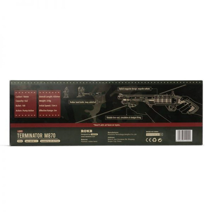 Product packaging for a gun with text and graphics on a black background